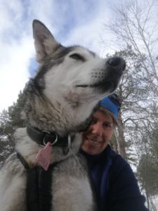 A woman and a husky